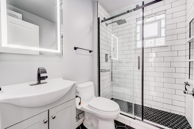 2147 N Latrobe Ave, Chicago, IL 60639 - full bath featuring vanity, a shower stall, and toilet
