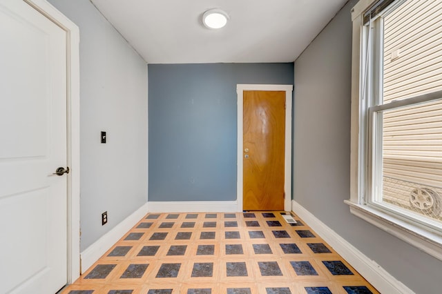 2147 N Latrobe Ave, Chicago, IL 60639 - entryway featuring tile patterned floors and baseboards