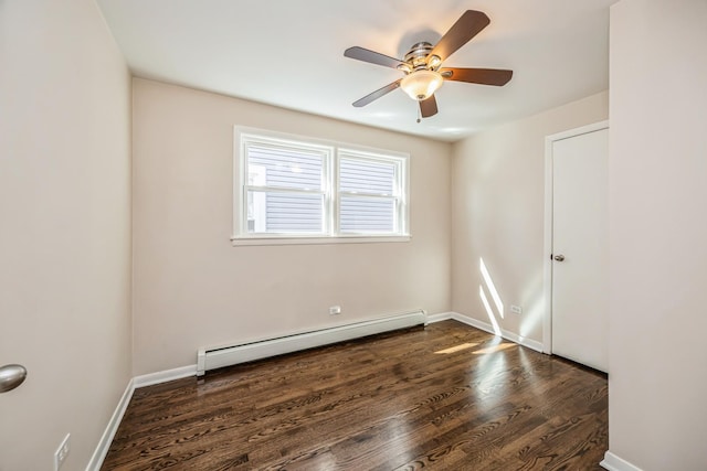 1432 Marengo Ave, Forest Park, IL 60130 - unfurnished room with a baseboard heating unit, baseboards, a ceiling fan, and dark wood-type flooring