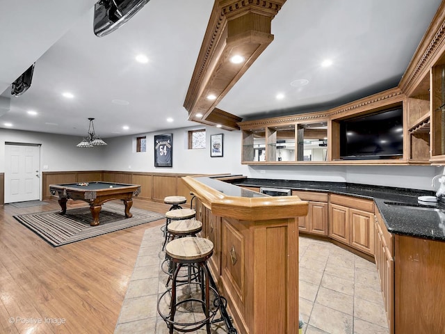 bar featuring indoor bar, a wainscoted wall, recessed lighting, and billiards