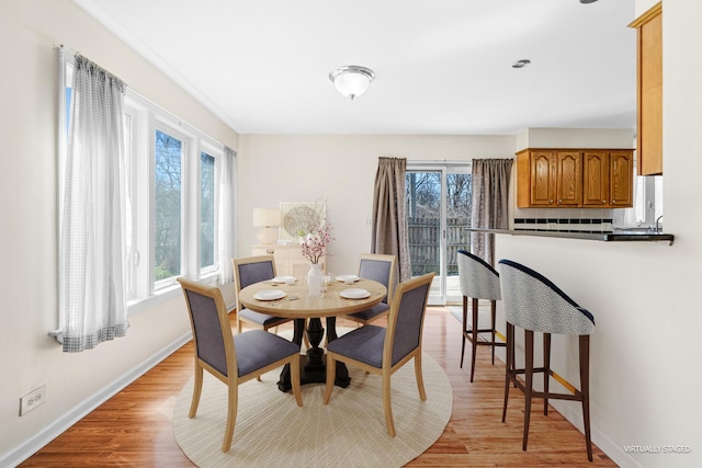 48 Hackberry Ln, Glenview, IL 60025 - dining space with light wood-style flooring and baseboards