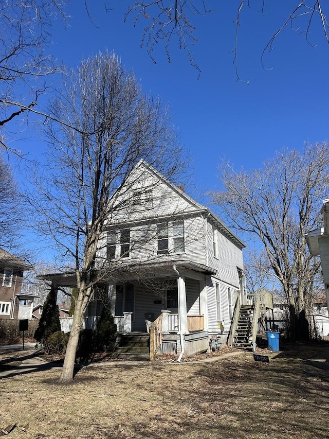 506 E Chestnut St, Bloomington, IL 61701 - view of front of property with a porch and stairs