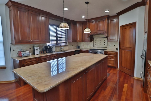 kitchen with a kitchen island, dark wood finished floors, decorative backsplash, and a sink