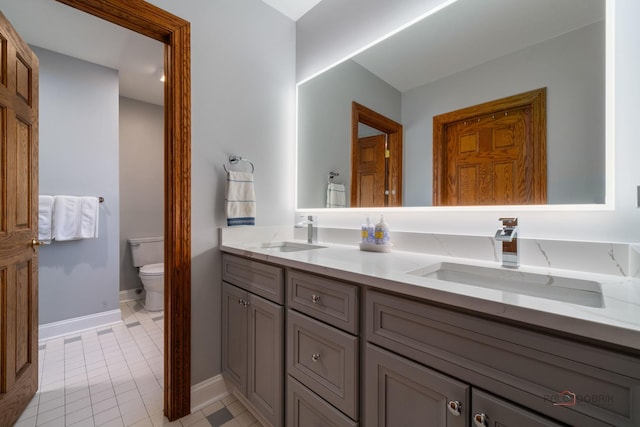 1330 Kurtis Ln, Lake Forest, IL 60045 - full bathroom with toilet, double vanity, baseboards, and tile patterned flooring