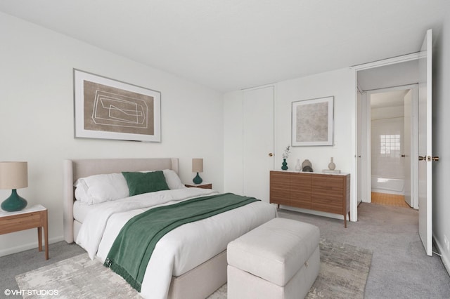 shared laundry area with stacked washer and clothes dryer, washing machine and dryer, a wealth of natural light, and baseboards
