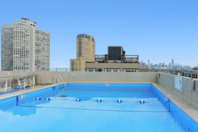 community pool with a city view