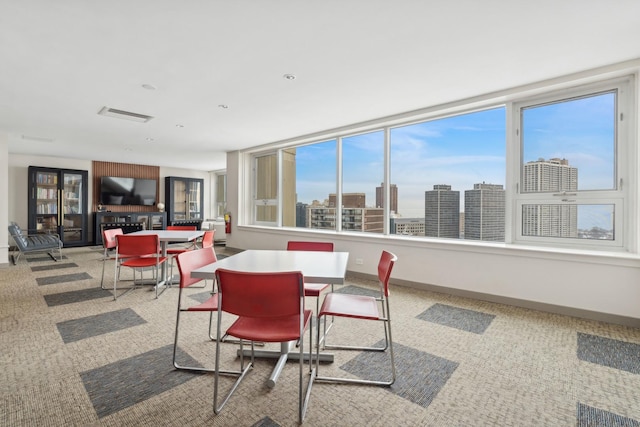 interior space with a wealth of natural light and visible vents