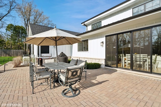 view of patio / terrace with fence and outdoor dining space
