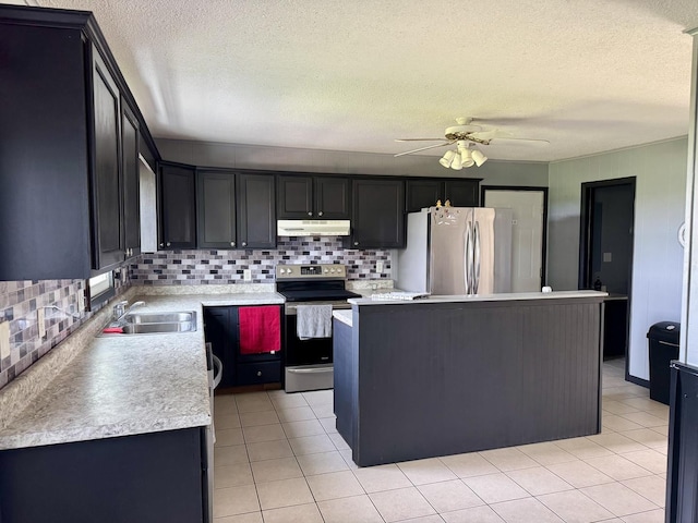 26812 US-150 Hwy, Leroy, IL 61752 - kitchen with appliances with stainless steel finishes, under cabinet range hood, a sink, a kitchen island, and ceiling fan