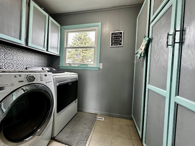 26812 US-150 Hwy, Leroy, IL 61752 - washroom featuring cabinet space, light tile patterned floors, and baseboards