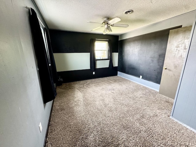 26812 US-150 Hwy, Leroy, IL 61752 - unfurnished room with a textured ceiling, a ceiling fan, and carpet flooring