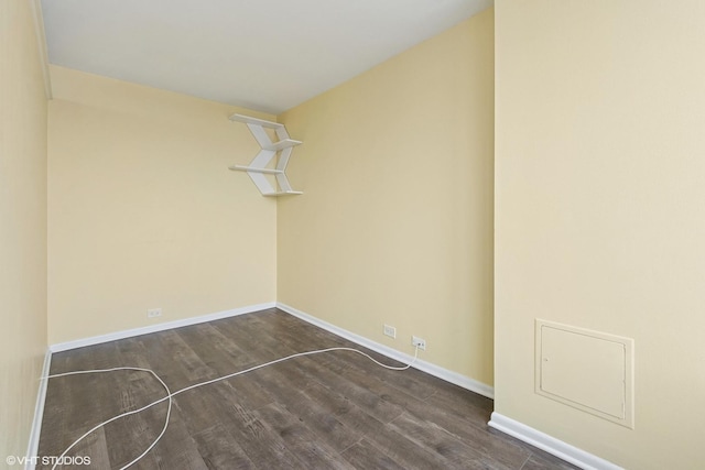 1560 N Sandburg Ter Unit 3207J, Chicago, IL 60610 - empty room with dark wood finished floors and baseboards