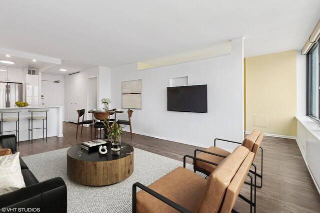 1560 N Sandburg Ter Unit 3207J, Chicago, IL 60610 - living area featuring dark wood finished floors, recessed lighting, visible vents, and baseboards