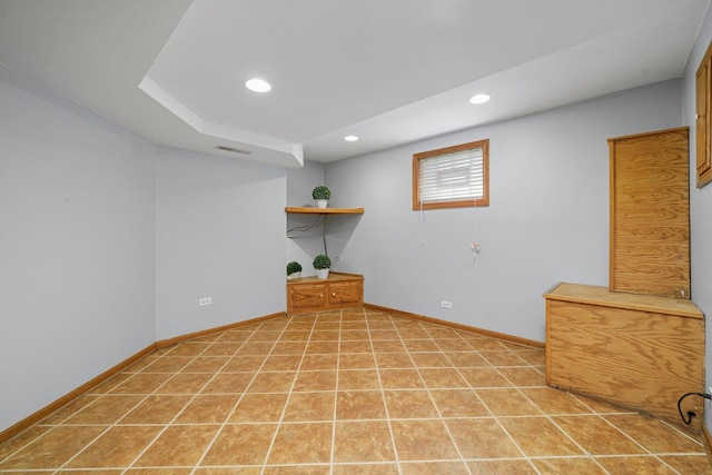 basement featuring recessed lighting, baseboards, and visible vents