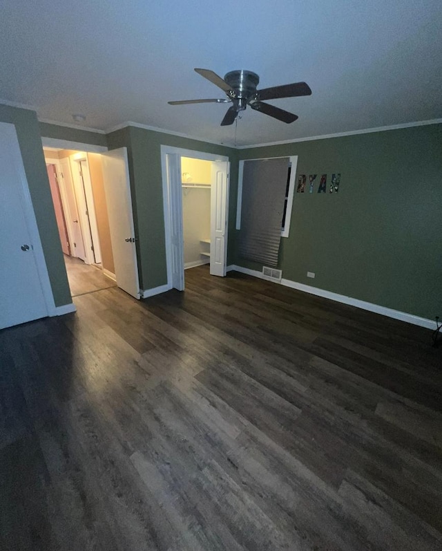 3105 172nd St, Hazel Crest, IL 60429 - unfurnished living room featuring ornamental molding, a ceiling fan, baseboards, and wood finished floors