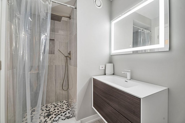 345 N La Salle Dr Unit 2501, Chicago, IL 60654 - bathroom featuring vanity and tiled shower