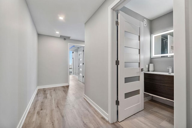 345 N La Salle Dr Unit 2501, Chicago, IL 60654 - hallway featuring light wood-style floors and baseboards