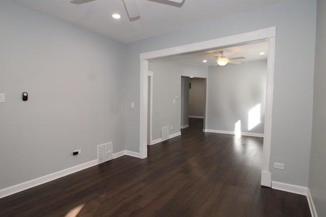 spare room with ceiling fan, dark wood-style floors, recessed lighting, and baseboards