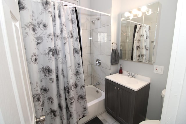 bathroom with vanity, shower / bathtub combination with curtain, and toilet