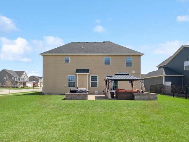 412 Towne Center Blvd, Shorewood, IL 60404 - back of property with a patio, outdoor lounge area, fence, a lawn, and a gazebo