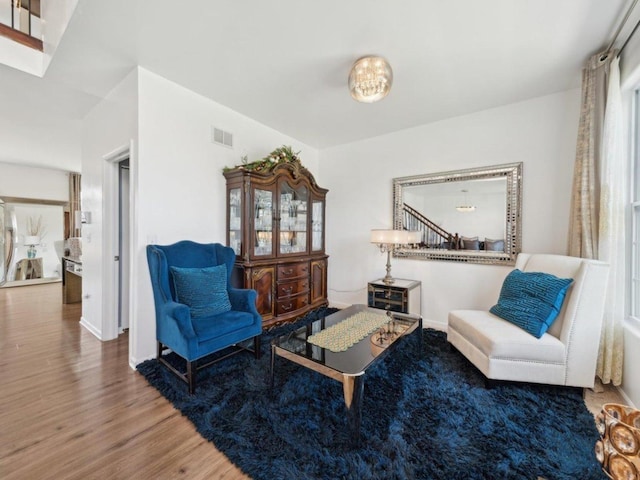 412 Towne Center Blvd, Shorewood, IL 60404 - sitting room featuring visible vents and wood finished floors