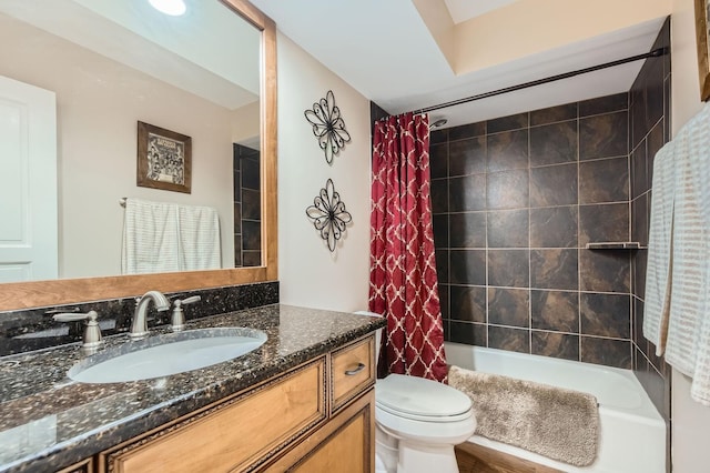 full bath with vanity, toilet, and shower / bath combination with curtain
