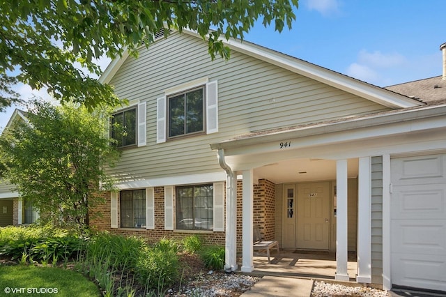 941 Yosemite Trl Unit C7, Roselle, IL 60172 - view of front of home featuring brick siding