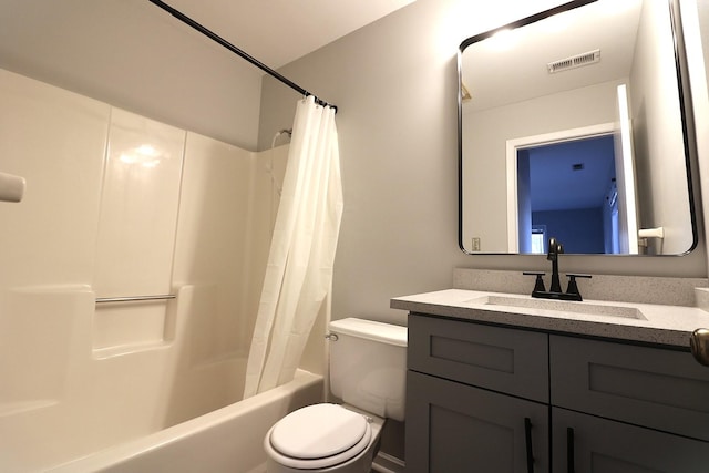 1503 N Milwaukee Ave Unit 2B, Libertyville, IL 60048 - bathroom featuring shower / bath combo, toilet, vanity, and visible vents