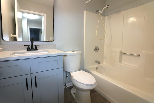 1503 N Milwaukee Ave Unit 2B, Libertyville, IL 60048 - full bath with shower / bathing tub combination, wood finished floors, vanity, and toilet