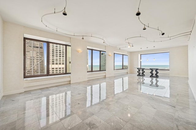 161 E Chicago Ave Unit 32A, Chicago, IL 60611 - empty room with marble finish floor and baseboards