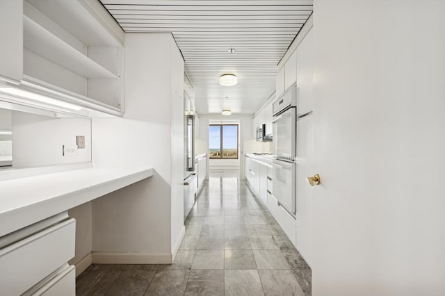 161 E Chicago Ave Unit 32A, Chicago, IL 60611 - corridor with baseboards and marble finish floor