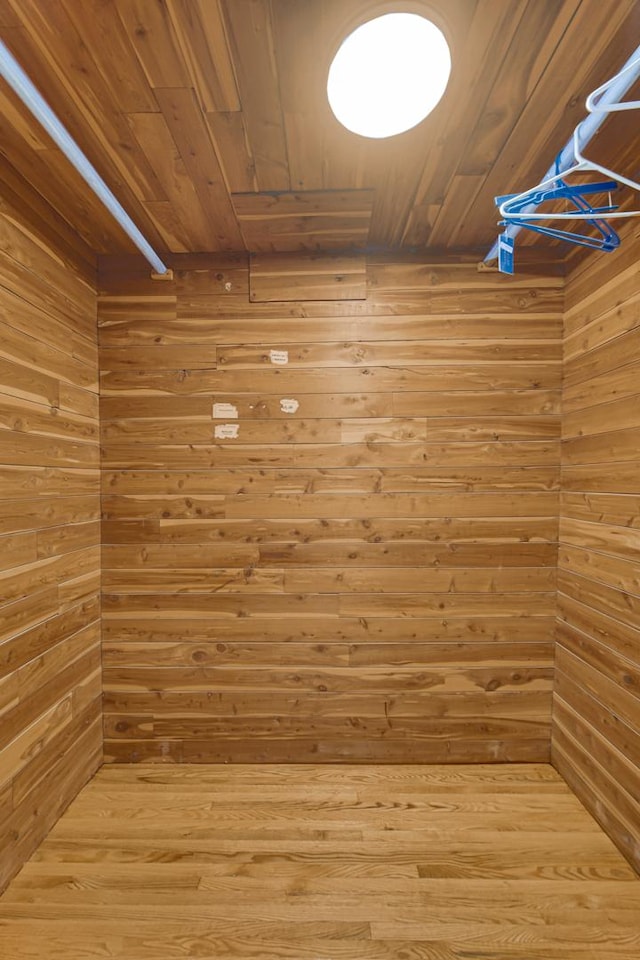 spacious closet with wood finished floors