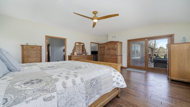 bedroom with dark wood finished floors, visible vents, lofted ceiling, a ceiling fan, and access to outside