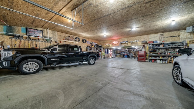 garage featuring a workshop area