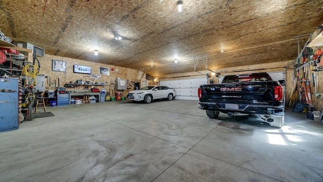 garage with a workshop area