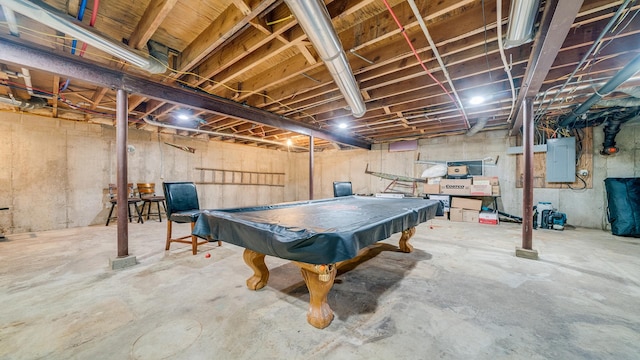playroom with concrete floors, electric panel, and billiards