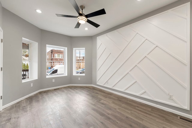 4819 W Superior St, Chicago, IL 60644 - spare room with healthy amount of natural light, a ceiling fan, wood finished floors, baseboards, and recessed lighting
