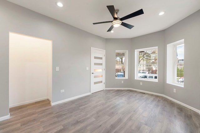 4819 W Superior St, Chicago, IL 60644 - spare room featuring wood finished floors, a ceiling fan, recessed lighting, and baseboards