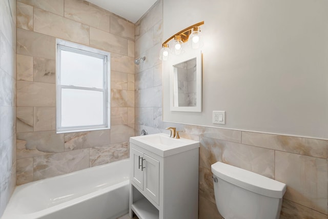 4819 W Superior St, Chicago, IL 60644 - bathroom with tile walls, toilet, vanity, and shower / tub combination