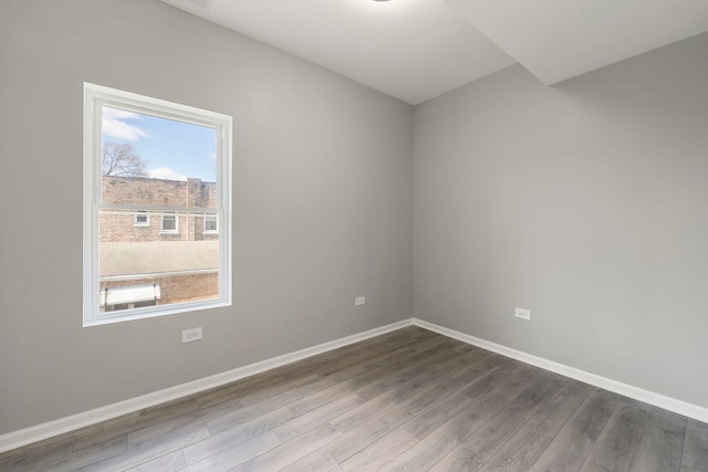 4819 W Superior St, Chicago, IL 60644 - unfurnished room with dark wood-style floors and baseboards