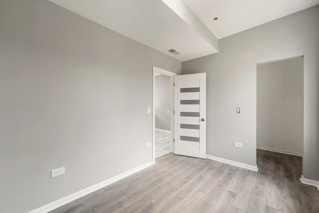 4819 W Superior St, Chicago, IL 60644 - unfurnished bedroom featuring light wood-style flooring and baseboards