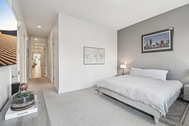bedroom with carpet flooring, recessed lighting, and baseboards