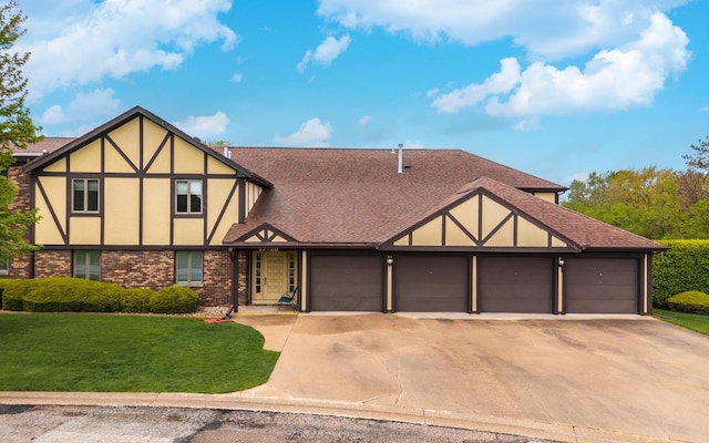 english style home with a front lawn, stucco siding, brick siding, concrete driveway, and an attached garage