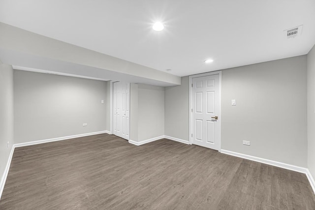 211 W 112th Pl, Chicago, IL 60628 - finished below grade area featuring visible vents, baseboards, recessed lighting, and dark wood-style flooring