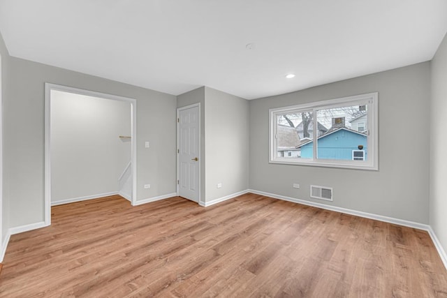 211 W 112th Pl, Chicago, IL 60628 - interior space with recessed lighting, baseboards, visible vents, and light wood-style flooring
