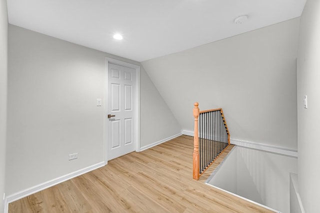 211 W 112th Pl, Chicago, IL 60628 - additional living space featuring baseboards, wood finished floors, and recessed lighting