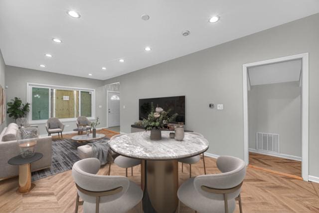 211 W 112th Pl, Chicago, IL 60628 - dining area featuring baseboards, visible vents, and recessed lighting