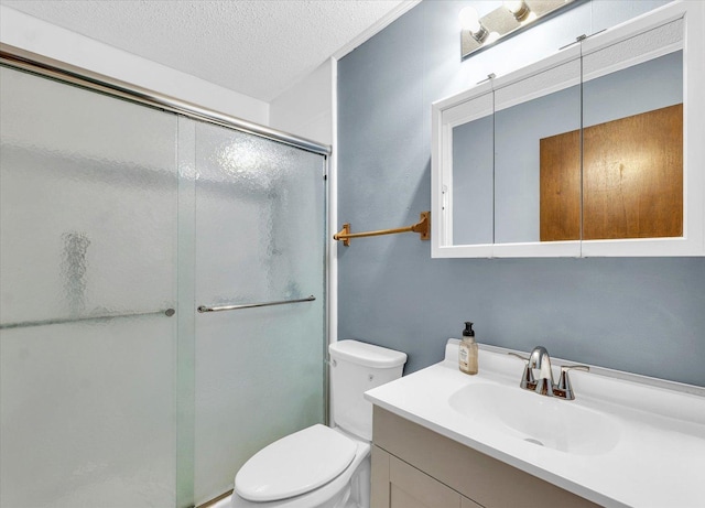 1045 Briarcliff Dr, Rantoul, IL 61866 - full bath featuring vanity, a stall shower, toilet, and a textured ceiling