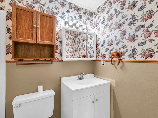 1045 Briarcliff Dr, Rantoul, IL 61866 - bathroom featuring toilet, vanity, wallpapered walls, and crown molding