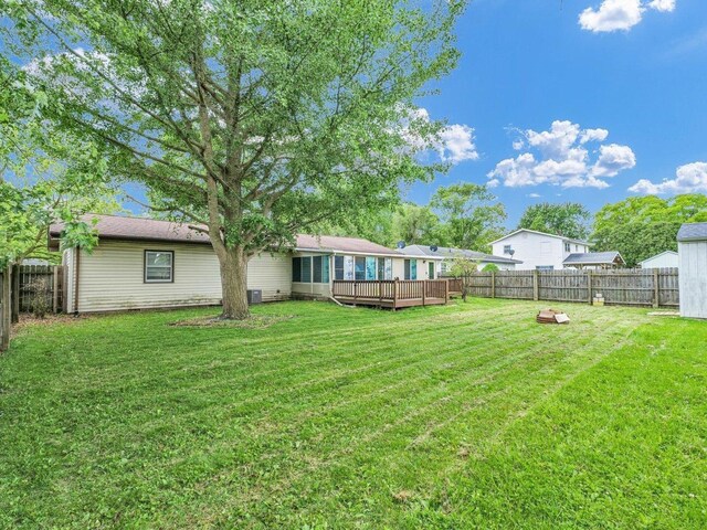 1045 Briarcliff Dr, Rantoul, IL 61866 - view of yard with a deck